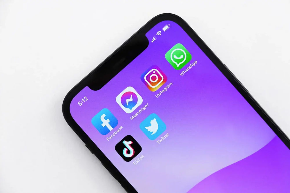 A smartphone screen with various social media apps